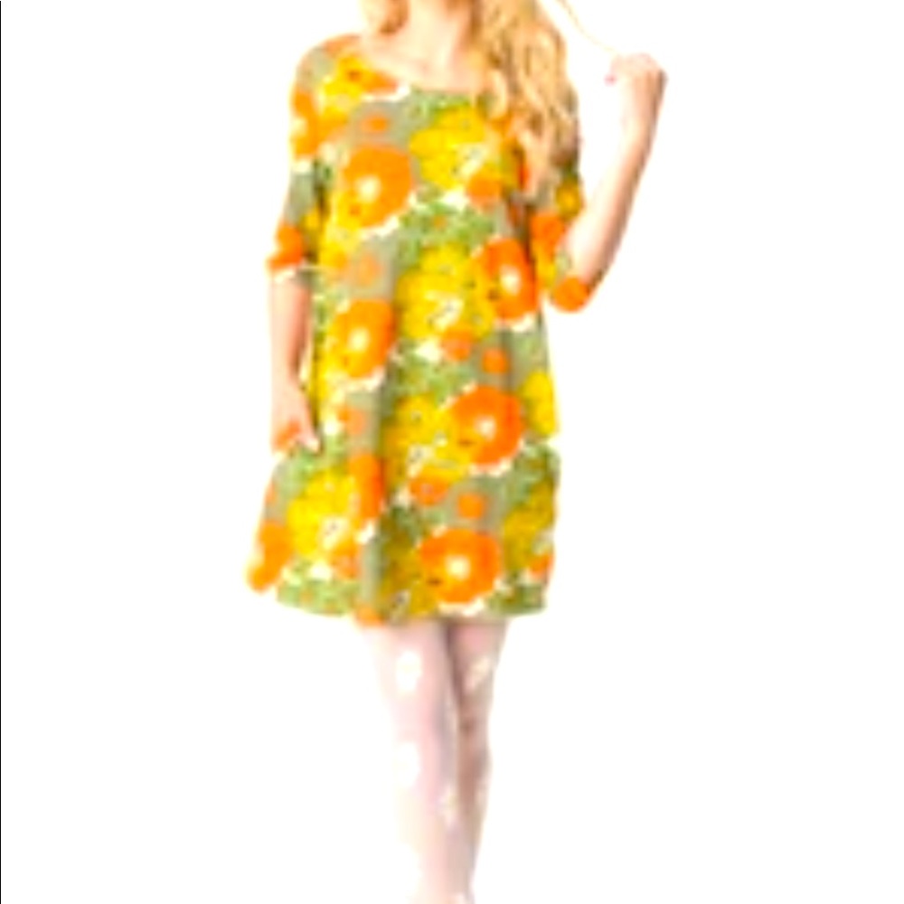Groovy 60’s dress size medium could also fit up to Xl brand new without tags